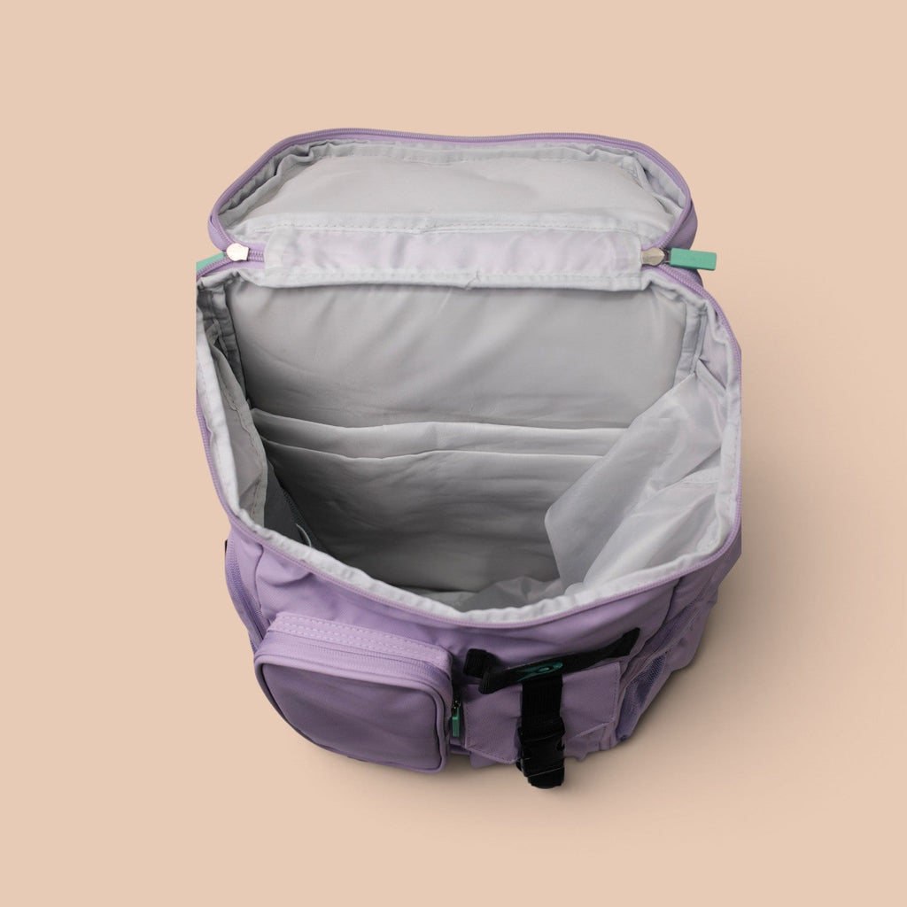 PVT Pickleball ARC bag in lavender with open main compartment showing interior organization pockets