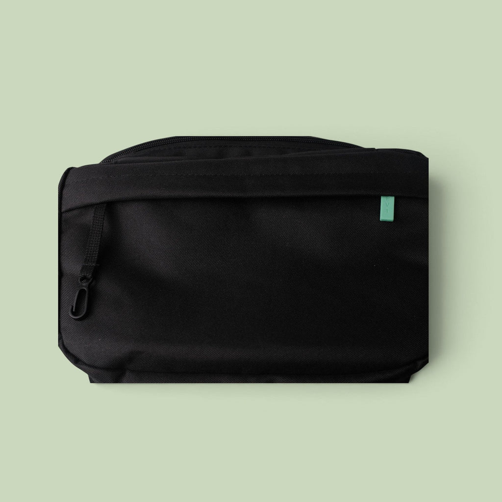 PVT Pickleball Bolt bag in black tear-resistant polyester with a small green logo tag, viewed from the front.